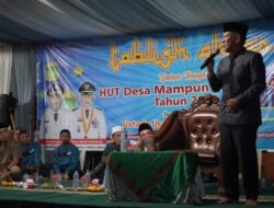 Hadir di Tengah Hujan Deras, Wabup A. Khafidh Puji Kinerja Kades Mampun Baru dan Ingatkan Siaga Bencana